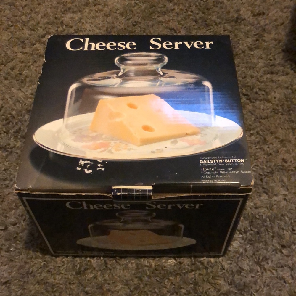 Vintage cheese server with glass dome. In original box.